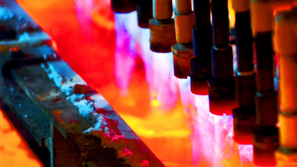 Burners maintain heat in molten Zincalume.<br />
Image courtesy of NZ Steel.