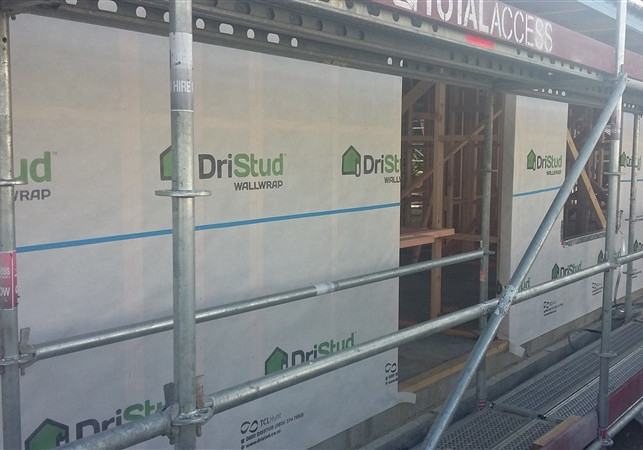 Combine DriStud Wall Wrap and Flashing Tape for Trusted Building Protection