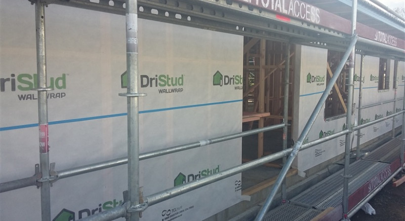 Combine DriStud Wall Wrap and Flashing Tape for Trusted Building Protection