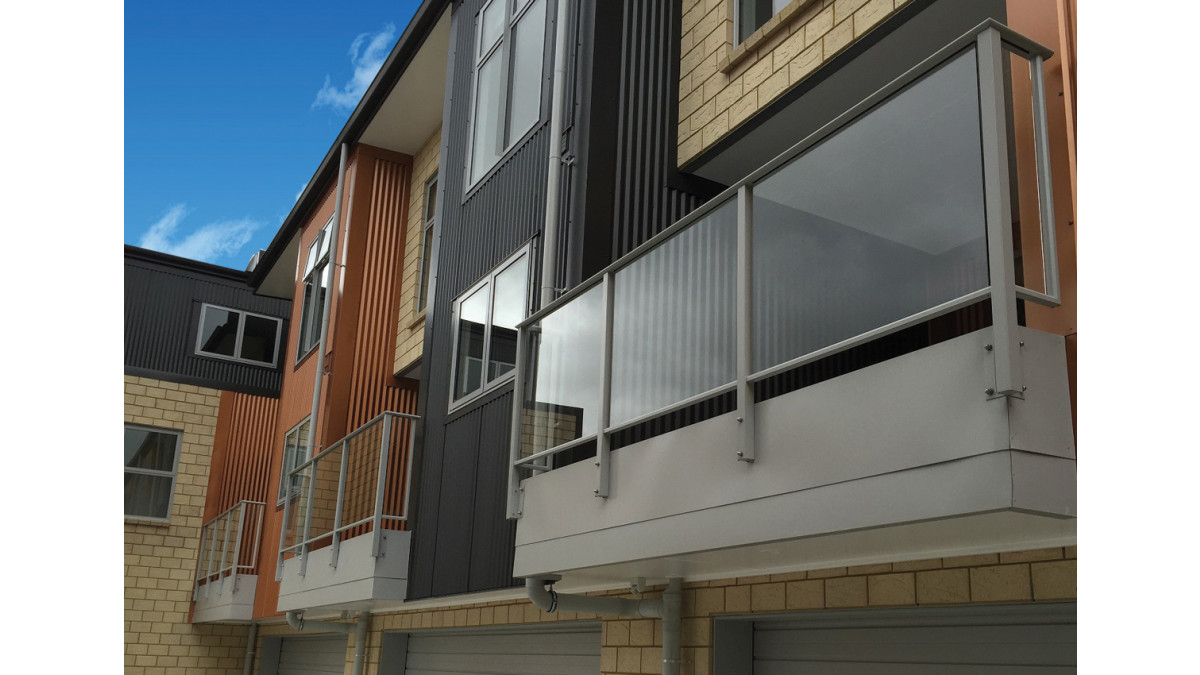 Vista style glass infill panels in look smart in this modern development.