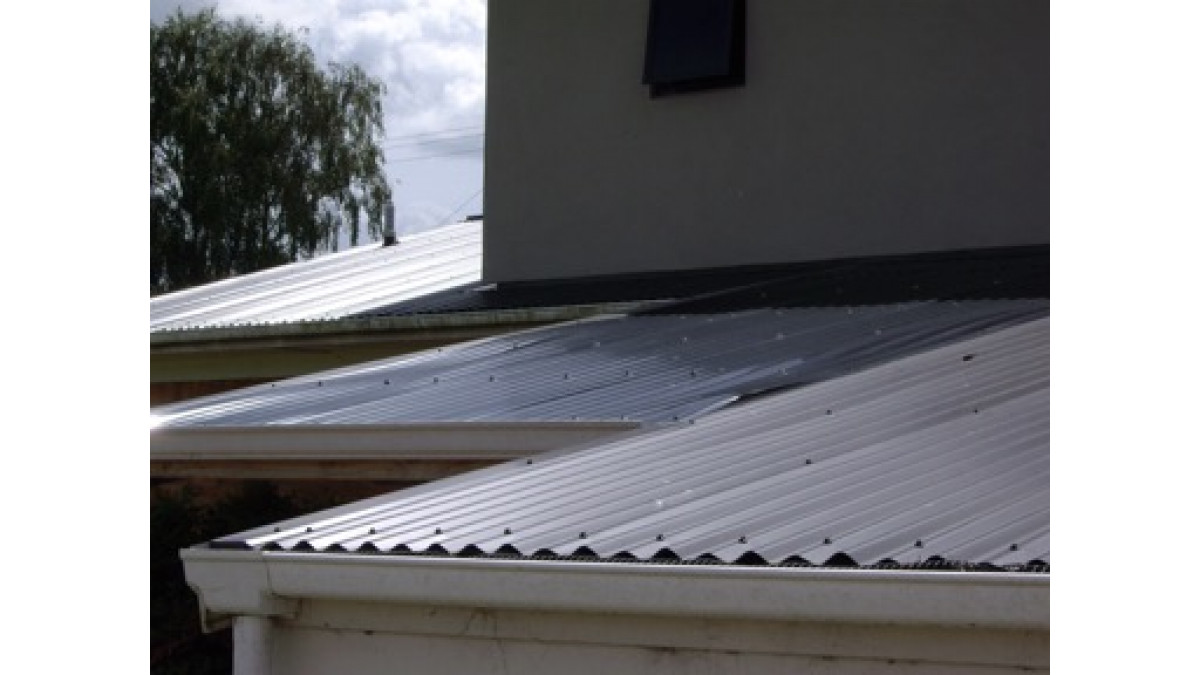 Mould and dirt build up on translucent roofing.