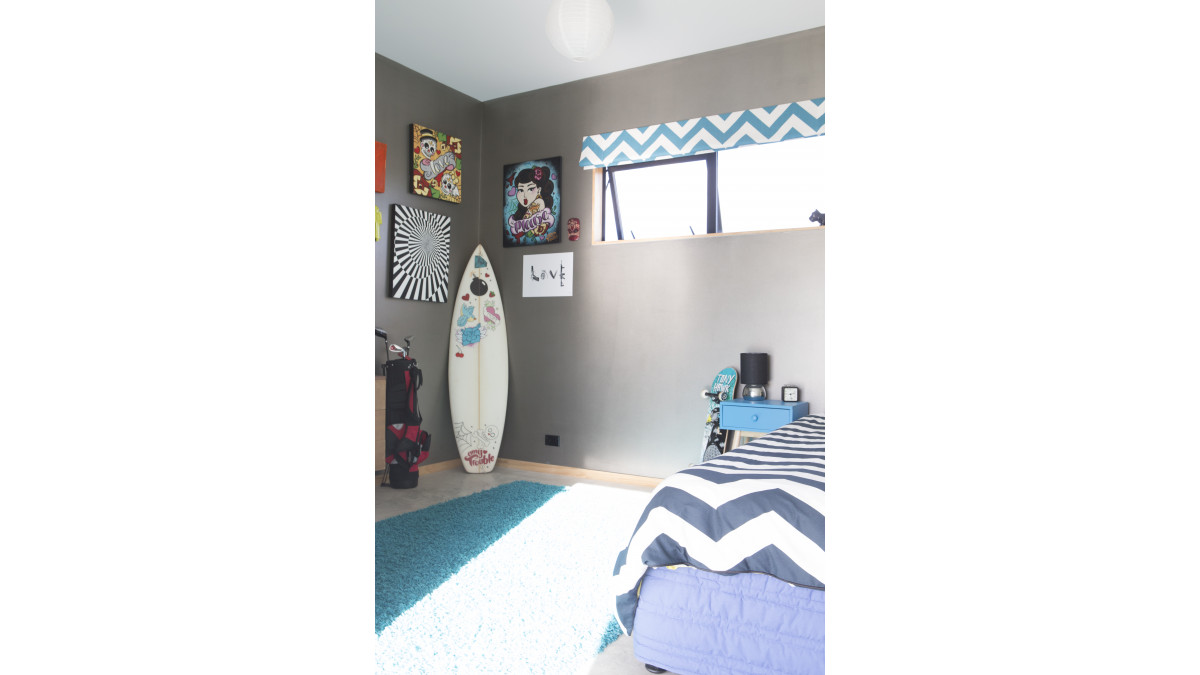 The metallic sheen of Resene Pure Pewter adorns this bedroom.