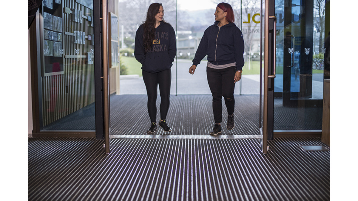 The CoralTread in the wind lobby removes dirt and moisture as people enter the building.