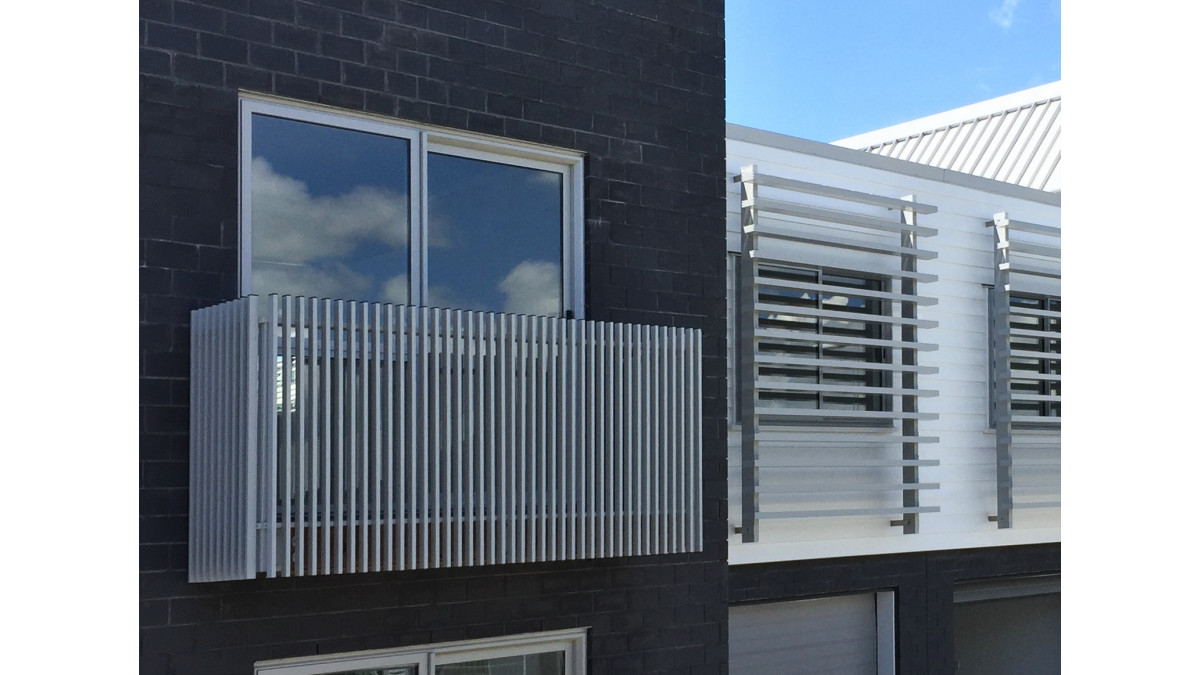 U shaped Fin balustrade alongside Spectrum louvres.