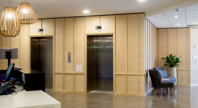 Pre-finished Ply Adds Warmth in Reception Upgrade