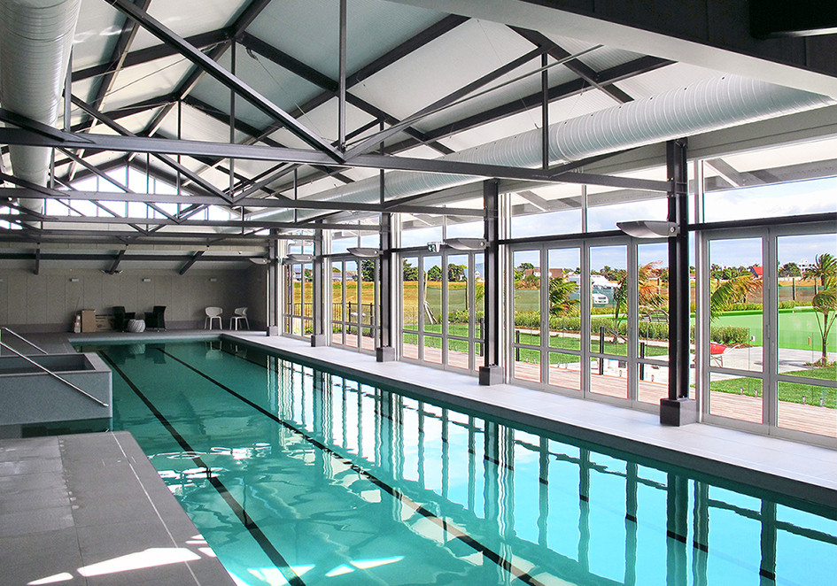 Energy-Efficient Heating and Condensation Control for Indoor Pool Pavilion