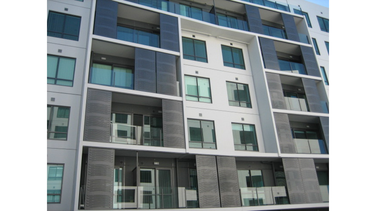 Sliding router cut privacy screens in central Auckland complex.