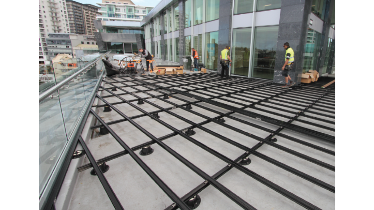 Commercial Building Auckland - QwickBuild on waterproof membrane deck mid-installation.