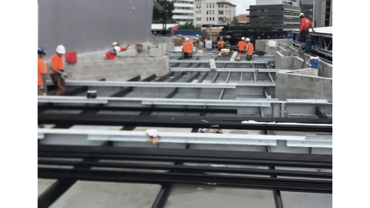 Commercial Rooftop Space Auckland - QwickBuild on waterproof membrane mid-installation.