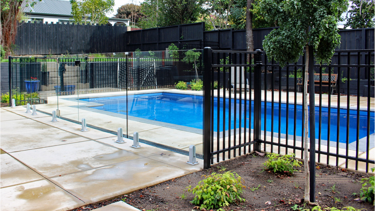Juralco Contemporary Pool Fencing and Edgetec Mini Post Frameless Glass Fencing with Matching Glass Gate.