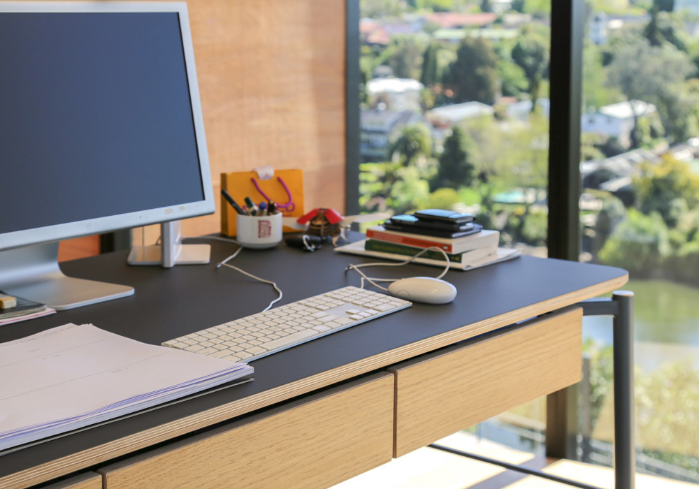 Matt Black Work Surfaces Add to Creative Agency’s Refined Look