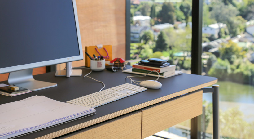 Matt Black Work Surfaces Add to Creative Agency’s Refined Look