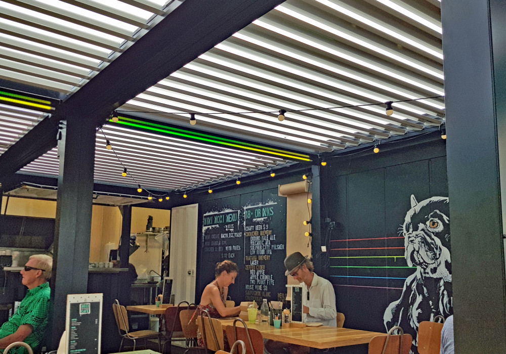 Bask Louvre Roof Provides Form and Function for Moxi Cafe
