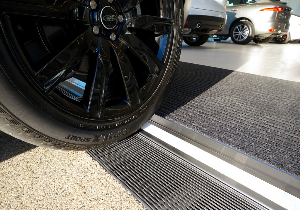 Allproof Provides Custom Level Threshold for Luxury Car Showroom