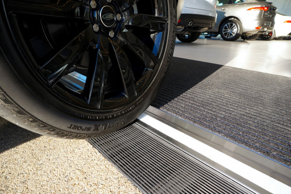 Allproof Provides Custom Level Threshold for Luxury Car Showroom