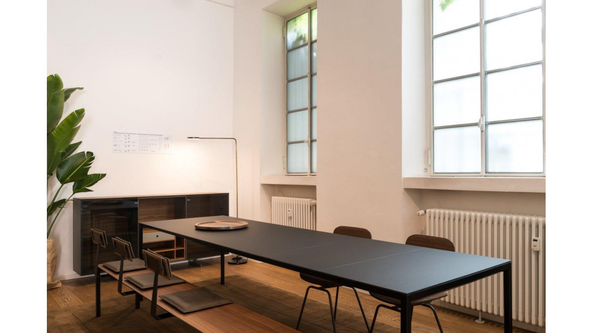Fenix at Milan Design Week — black table top.