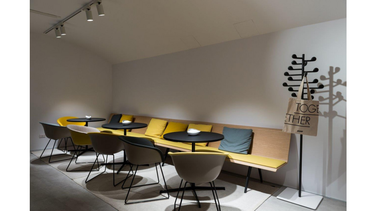 Fenix at Milan Design Week — black table tops.