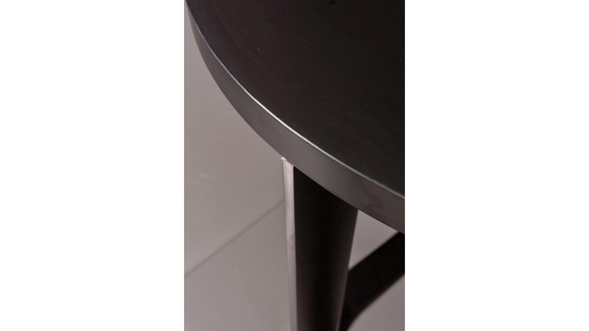 Fenix at Milan Design Week — black table top close-up.