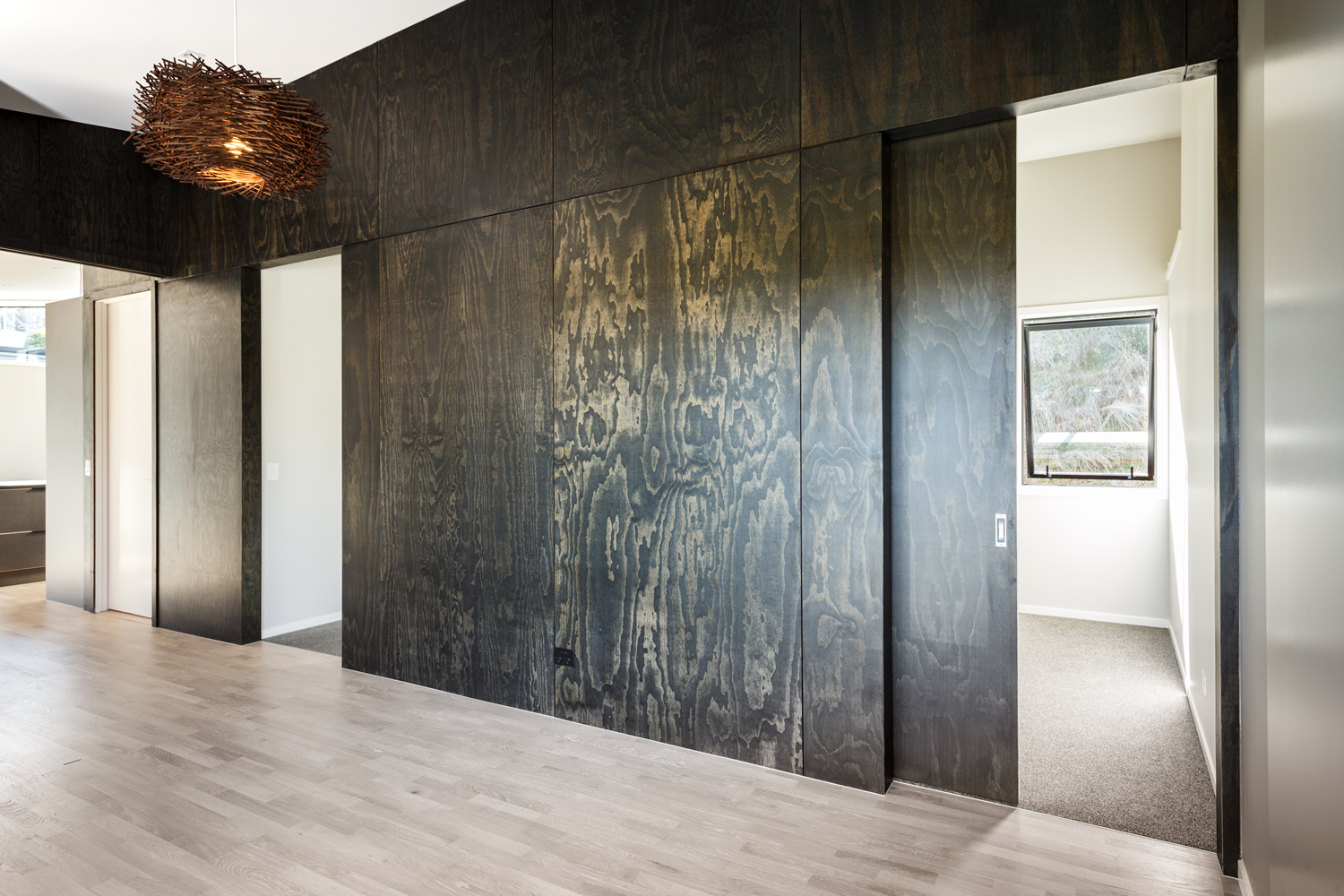 A Striking Feature Wall In Black Satin Plywood Eboss