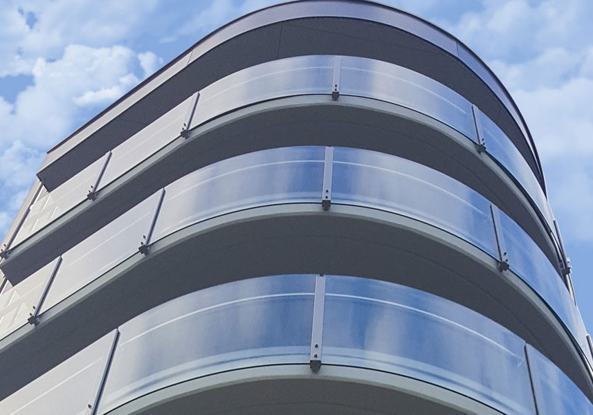 Curved Glass Balustrades Enhance Rose Garden Apartments