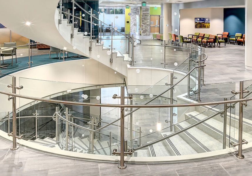 Curved Glass Stairwell Offers Safety and Style for Medical Centre