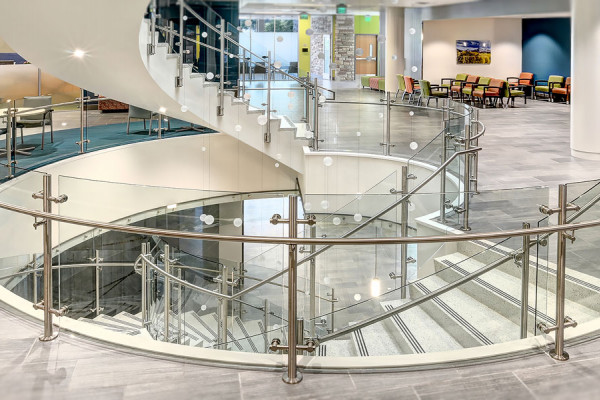 Curved Glass Stairwell Offers Safety and Style for Medical Centre