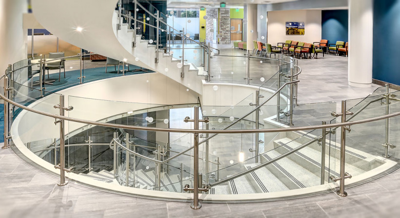 Curved Glass Stairwell Offers Safety and Style for Medical Centre