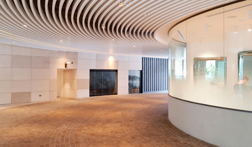 Curved Glass Facade Welcomes Customers to Koda Salon
