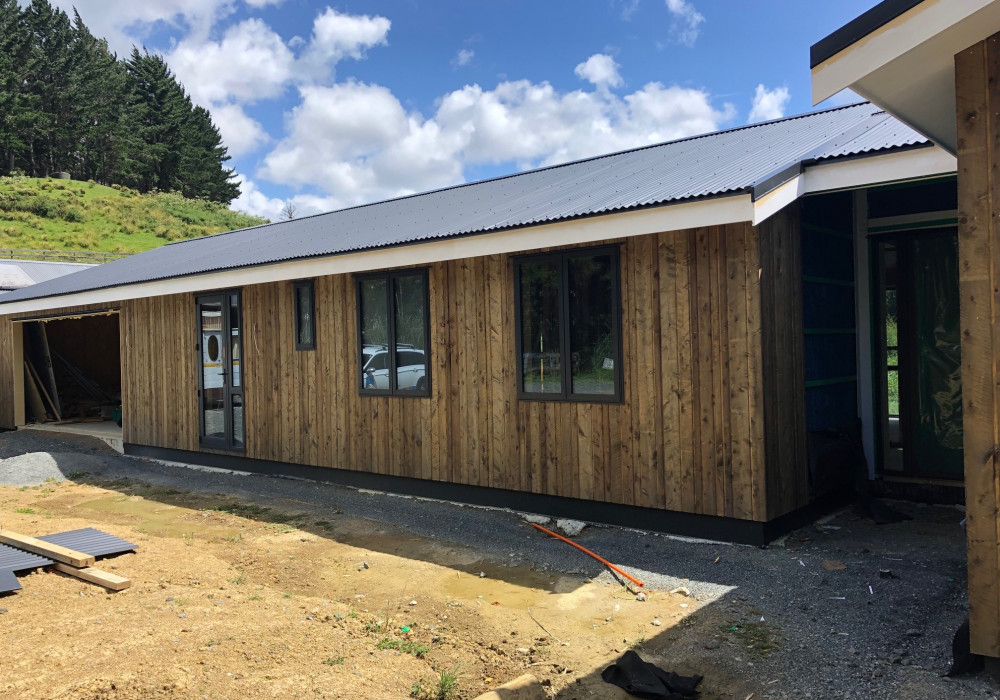 SIP Panel House Protected with ADHERO Self Adhesive Wrap