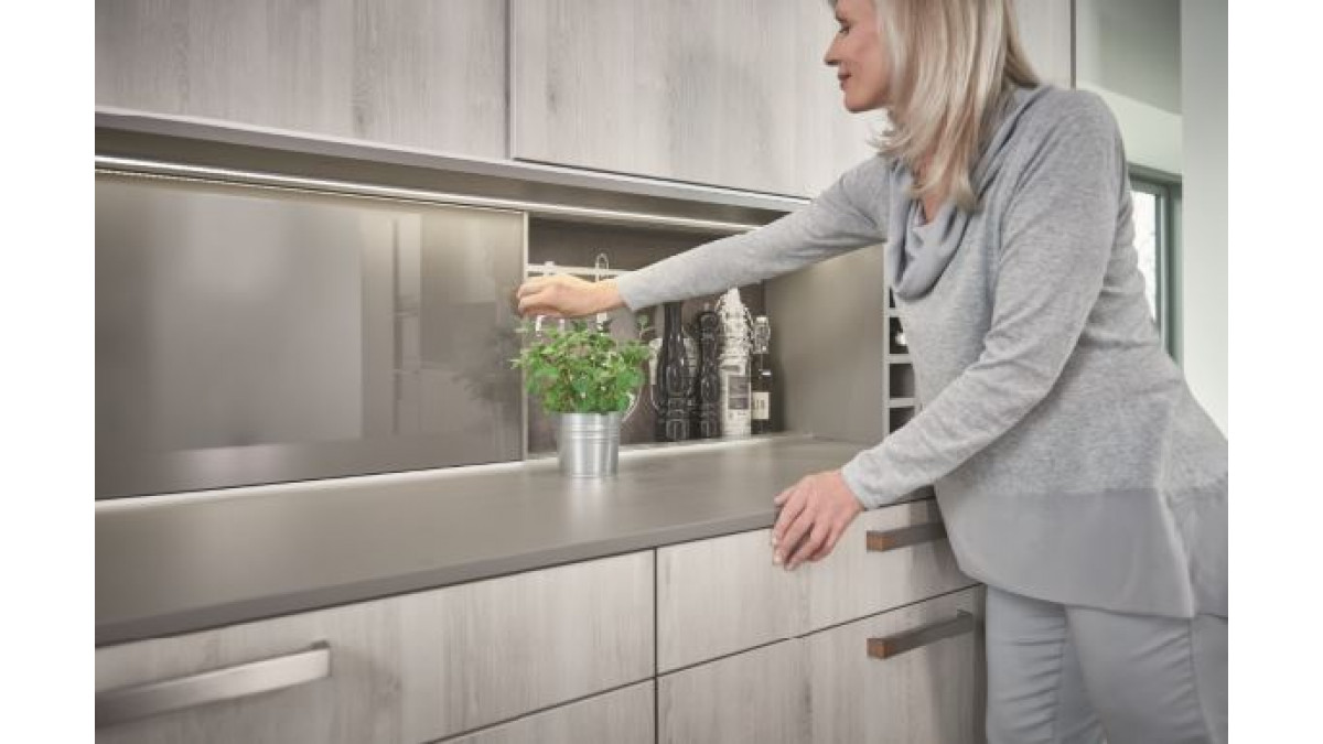 Mid-way cabinets provide easy to reach storage access that can also be used as glass splash back behind cook tops.