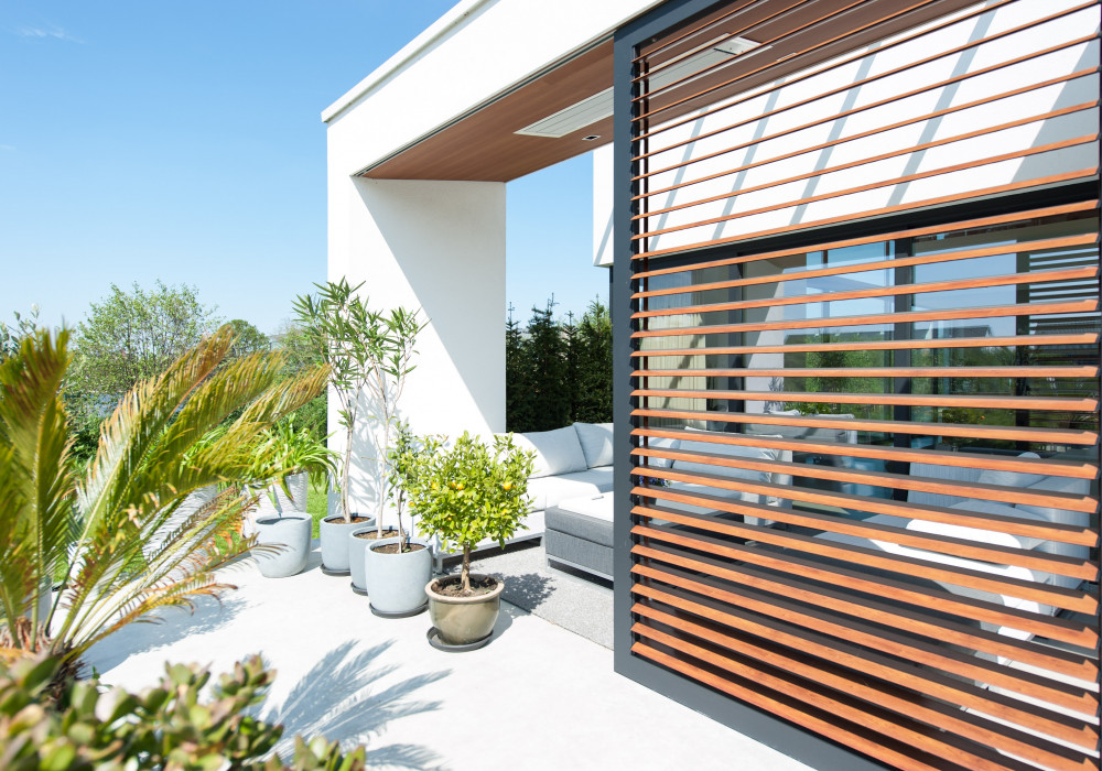 The Warmth of Timber and the Durability of Aluminium Louvres Combined