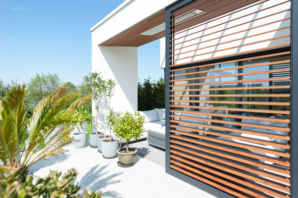 The Warmth of Timber and the Durability of Aluminium Louvres Combined