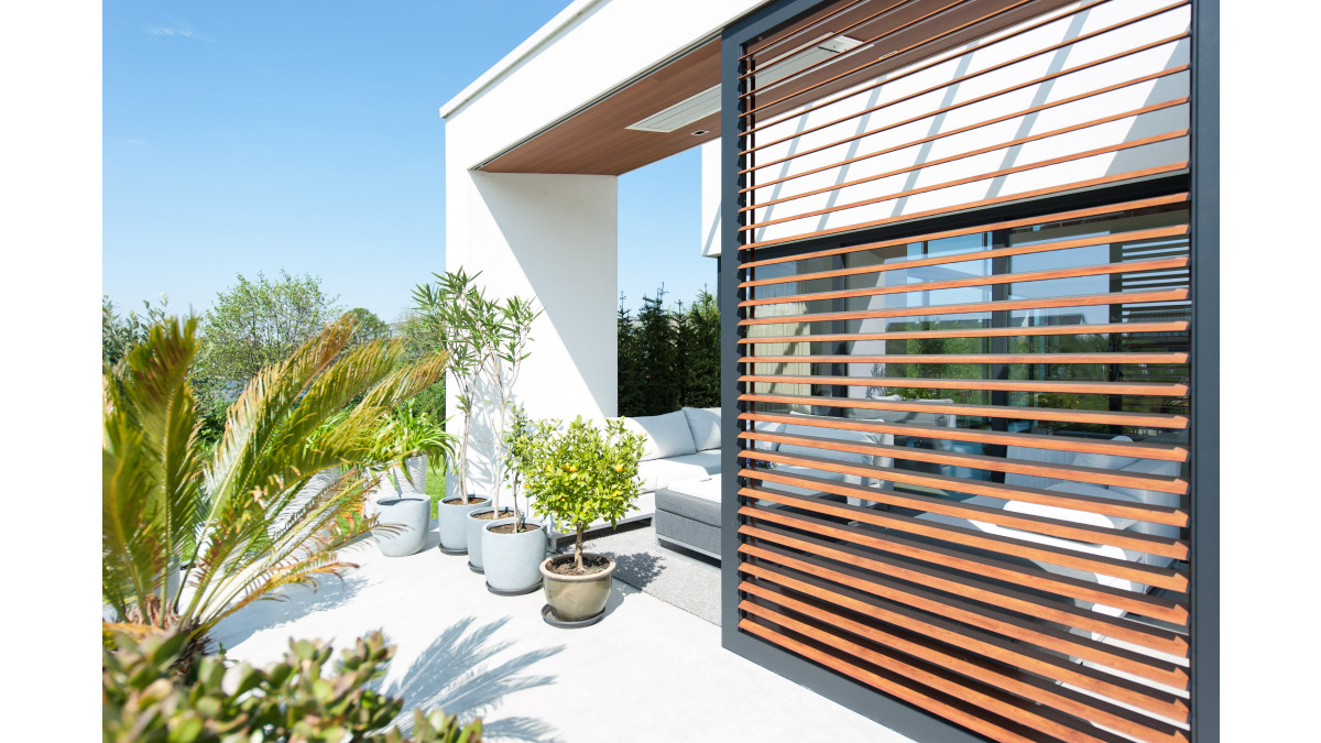 Aluminium Shutters by Louvretec with a woodgrain finish. 