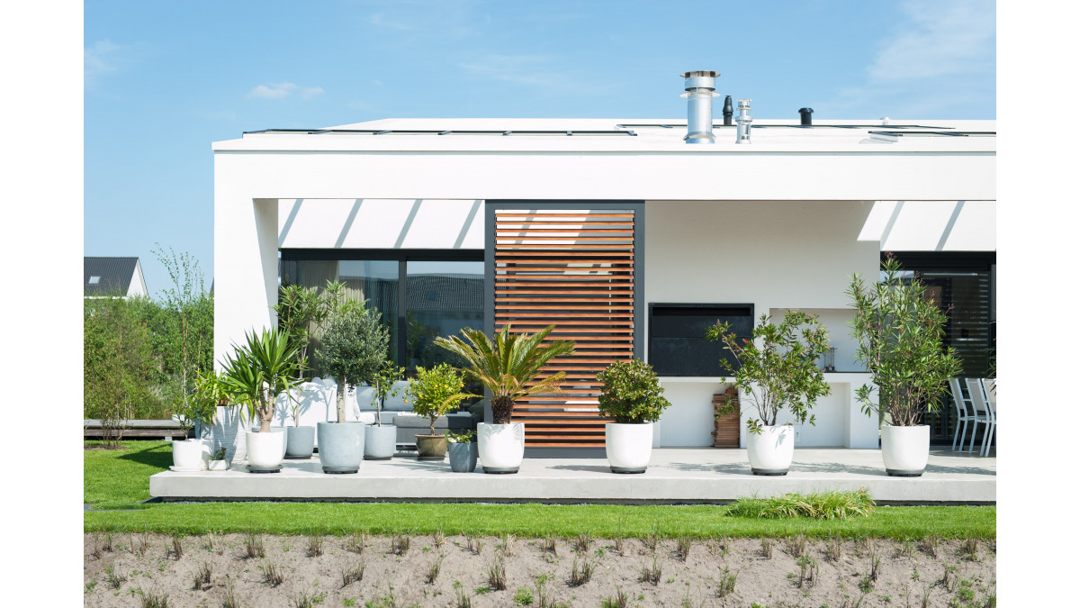 Aluminium Shutters with a woodgrain finish by Louvretec.