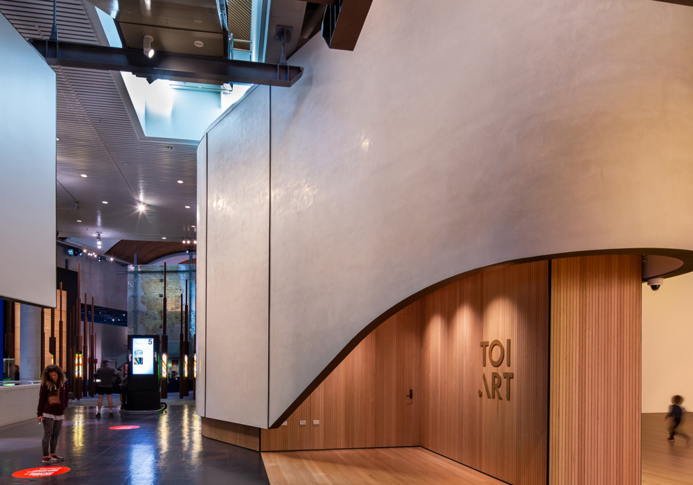 Luminous Curved Render Entrance Welcomes Visitors to Toi Art Gallery