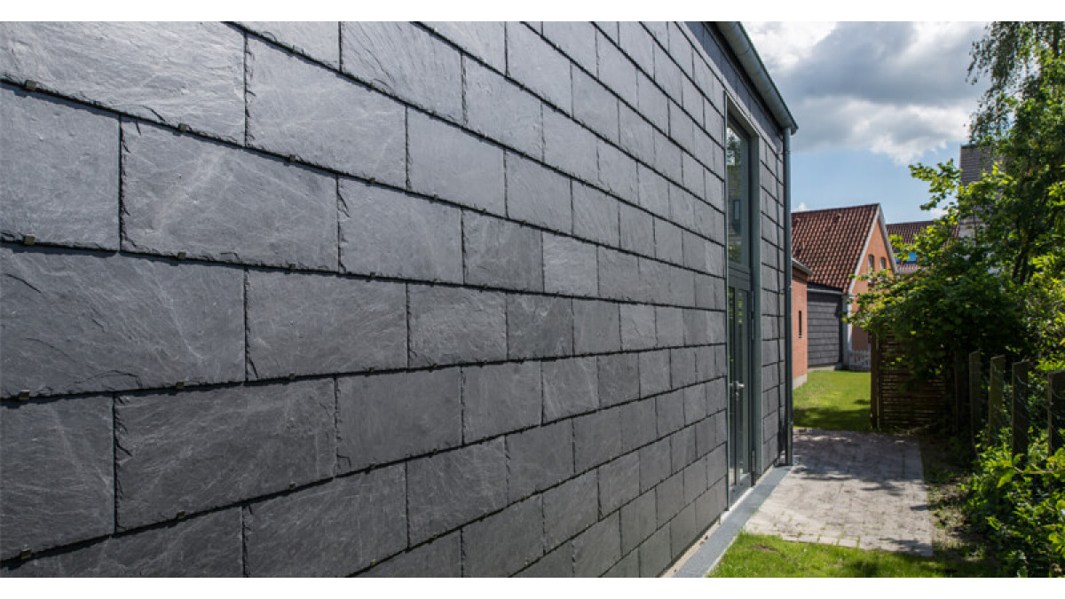 Natural slate ventilated facade.