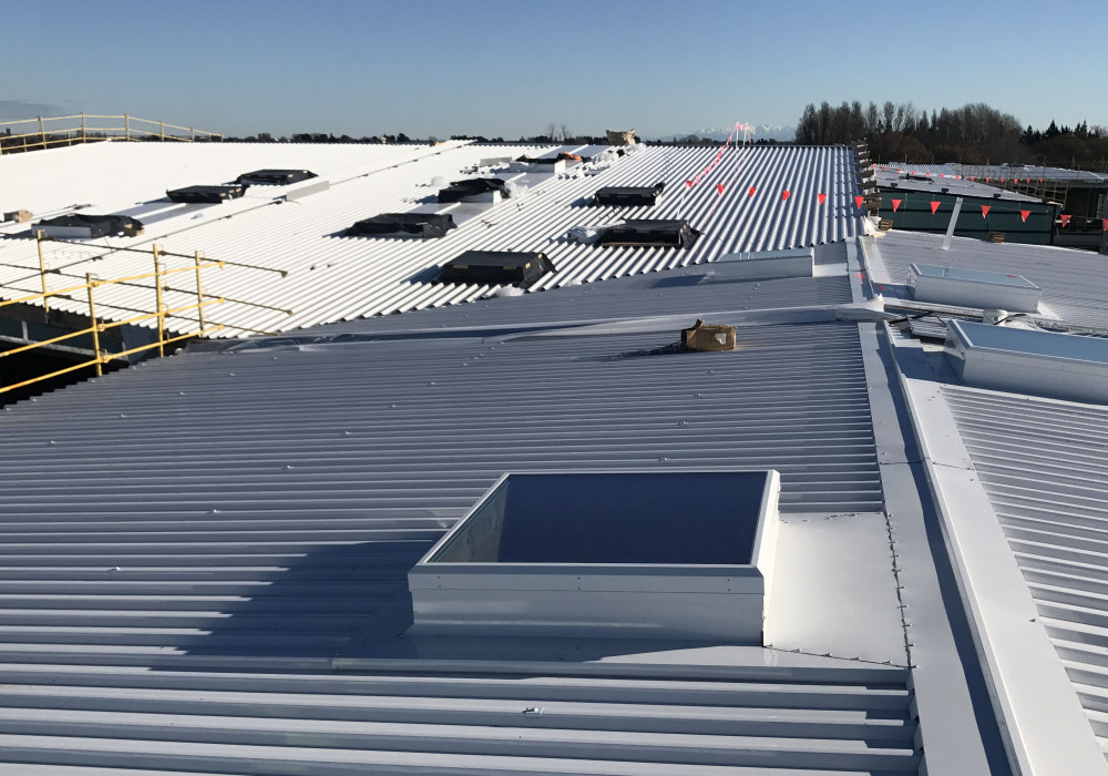 High-Performance Warm Roof System Specified for Combined High School Campus