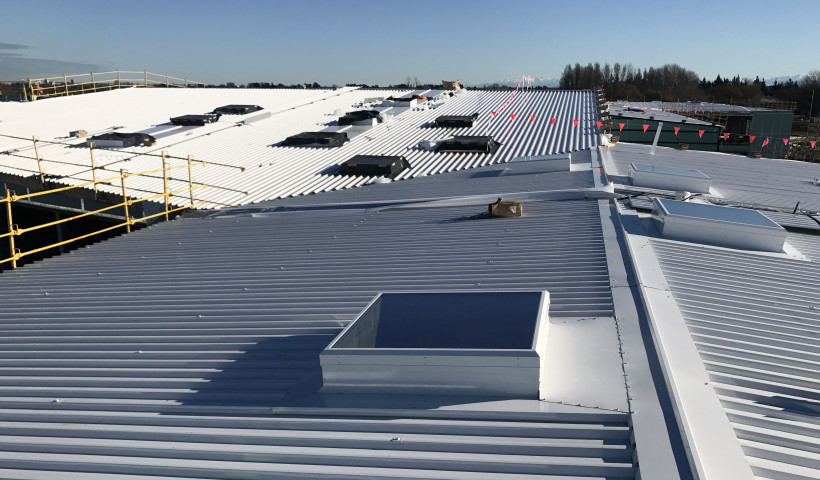 High-Performance Warm Roof System Specified for Combined High School Campus
