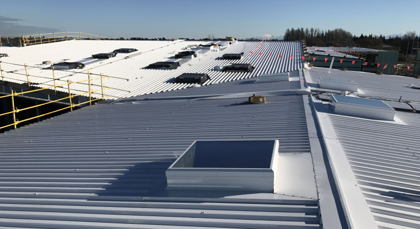 High-Performance Warm Roof System Specified for Combined High School Campus