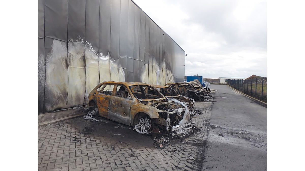 The aftermath of the fire at an Audi dealership taken shortly after the fire event. The car in the foreground is understood to be an Audi Q3 with other cars being of at least a similar make and model.
