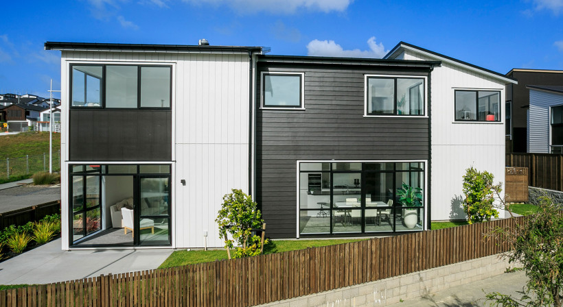Black Downpipes and Spouting Match Joinery in Outstanding Coastal Home 
