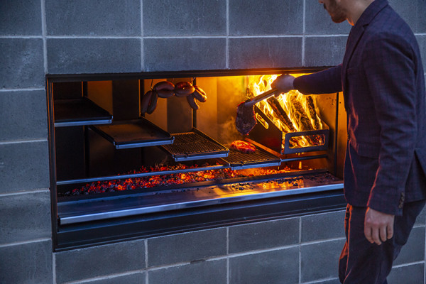 New Fireplace Kitchen Enhances Outdoor Entertaining