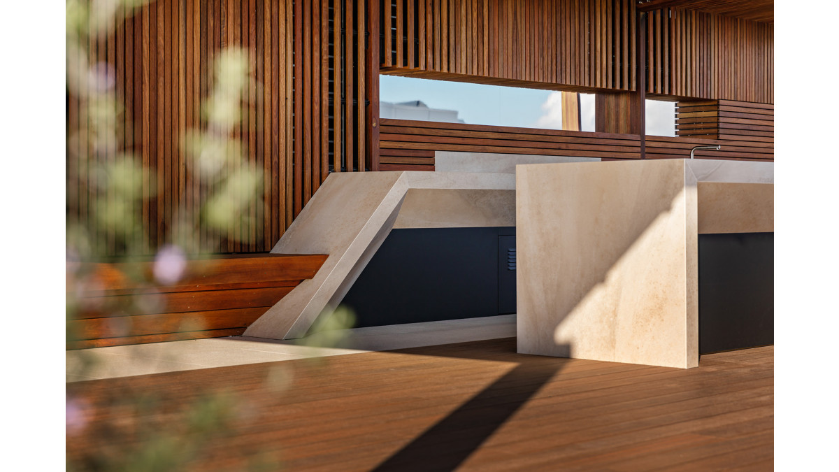 Decking, tiles and turf installed on pre-fab aluminium framing system.