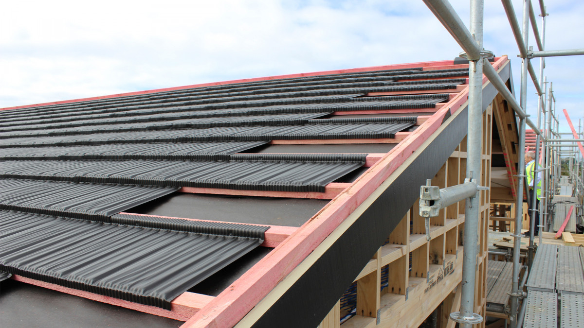 Metrotile's roofers paper and batten the roof, saving the costs of purlins and builders time on the roof.