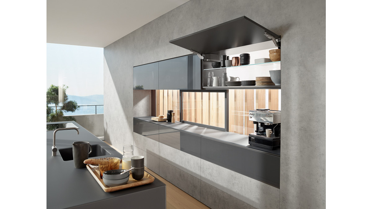Blum AVENTOS HK top — Overhead cabinet storage.