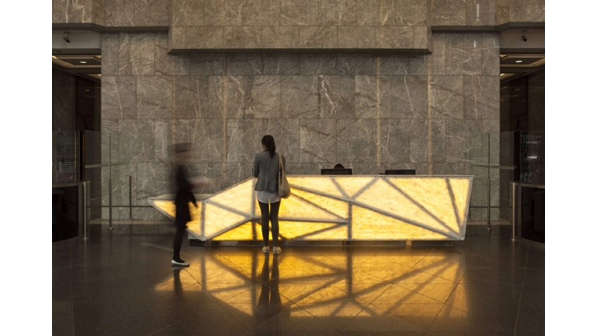 Corian Witch Hazel used on the striking backlit reception counter for the Auckland House Office Project. <br />
Designed by Creative Spaces<br />
Fabricated by Jones and Sandford<br />
Photography by Simon Devitt