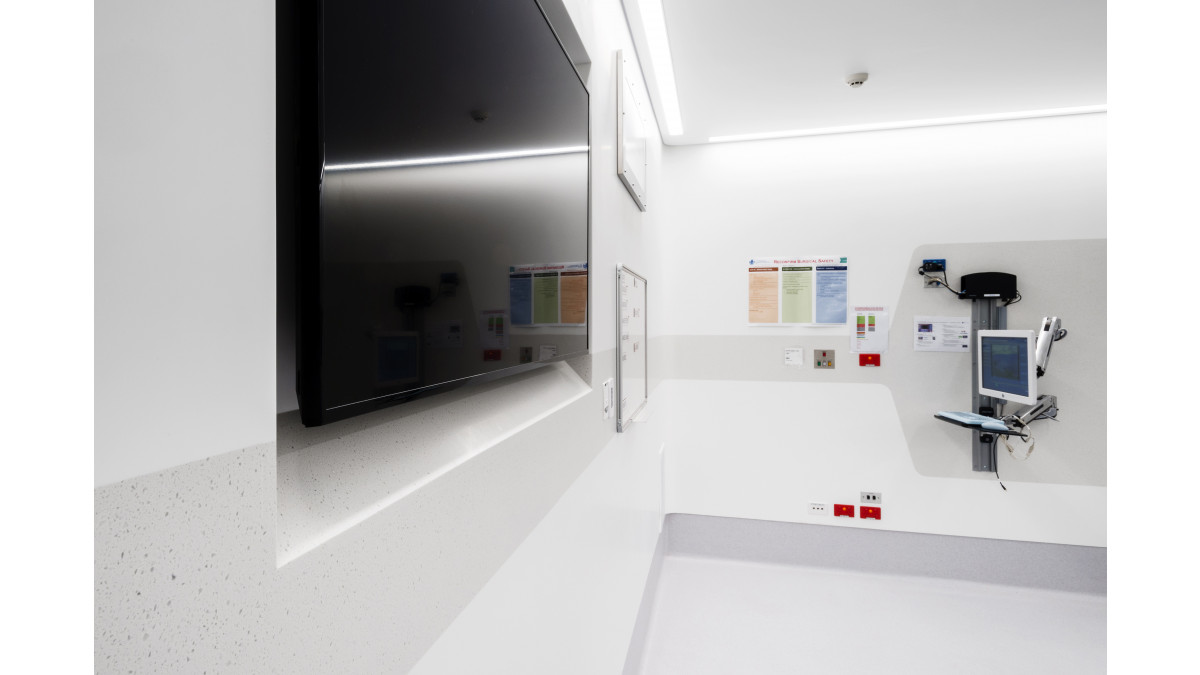 Corian Glacier White and Aspen used for complete internal wall cladding in operating rooms, and scrub area St Vincent’s Hospital, Sydney. <br />
Designed by Angel Mahchut Pty Ltd. <br />
Photography by Kevin Chamberlain Photography.