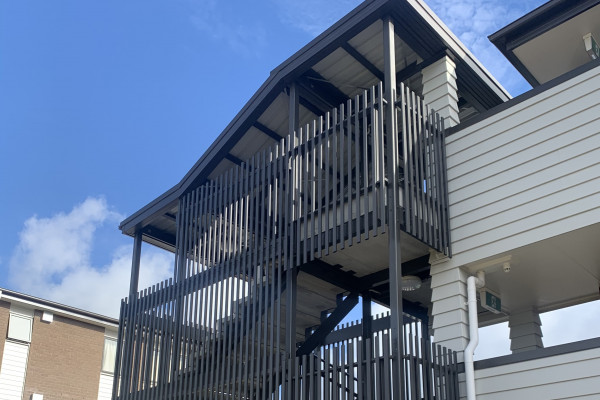 Stairwell Rain Screen Solution with Face Hung Fin System