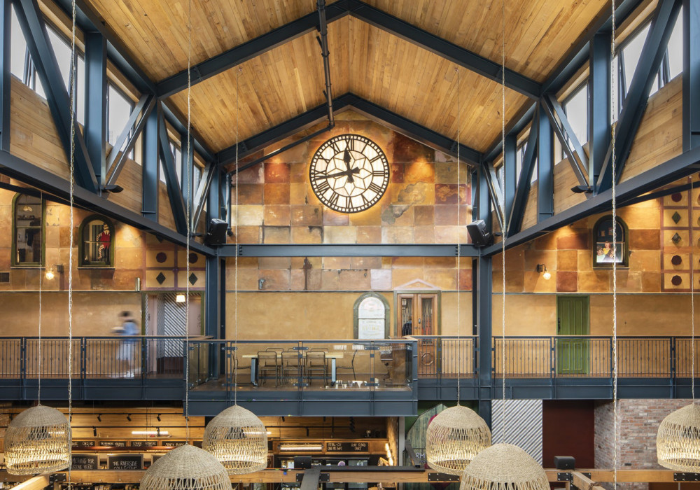 Bespoke Finishing Brings Warmth and Flair to Riverside Market