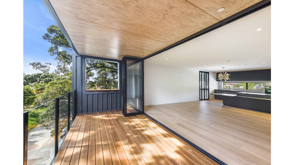 Bi-folds span a wide deck on one of the Betts apartments.